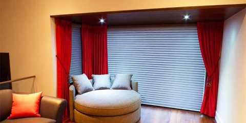 Red Curtains with remote control blinds in Toronto.