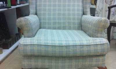 Wing chair before re­upholstery