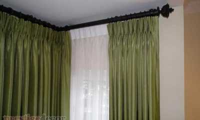 Green draperies with sheers