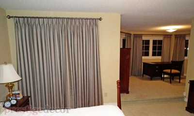 Pinch pleat curtains in the master bedroom