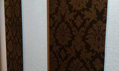 Closeup of modern brown pattern vertical panel tracks