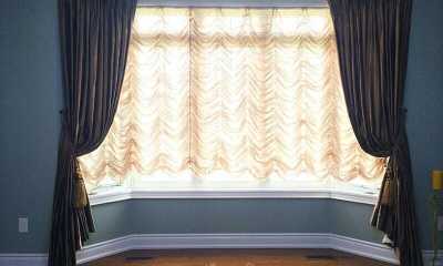Bay window curtains in a Brampton home.