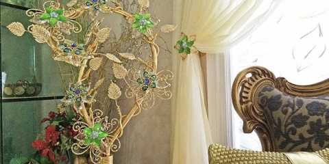Luxurious window treatments with sheer sidepanels, Swarovski crystal holdbacks and lamp from Prestige Decor