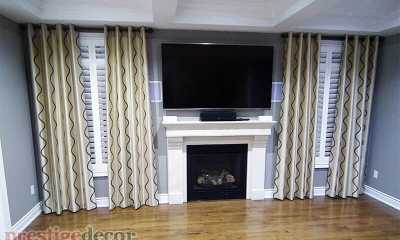 Modern grommet curtains with interior shutters in a Brampton home.