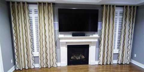 Modern grommet curtains with interior shutters in a Brampton home.