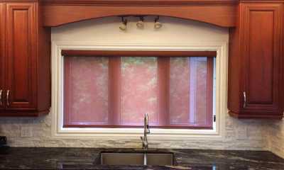 Colour matched roller blinds in the kitchen