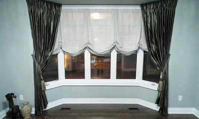 Bay window curtains in a Brampton home.