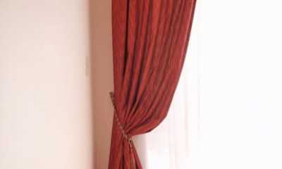 Custom sheers on an Ibeam rod with drapery panels on a decorative rod