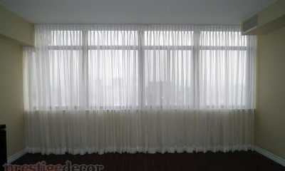 Elegant sheer curtains in a condo in Toronto