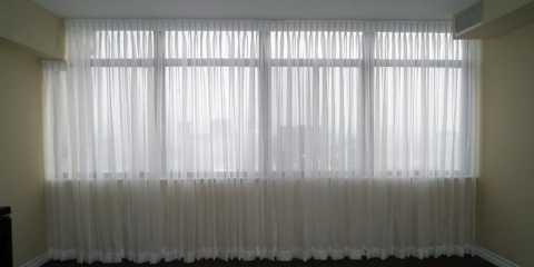 Elegant sheer curtains in a condo in Toronto