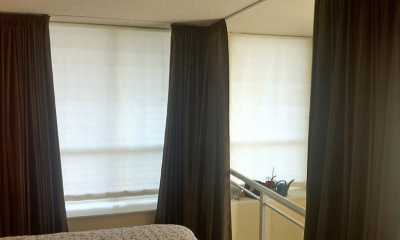 Custom blackout condo curtains in Toronto. These blackout curtains slide freely on a KS track creating total privacy.