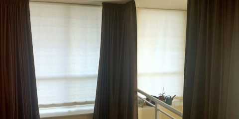 Custom blackout condo curtains in Toronto. These blackout curtains slide freely on a KS track creating total privacy.