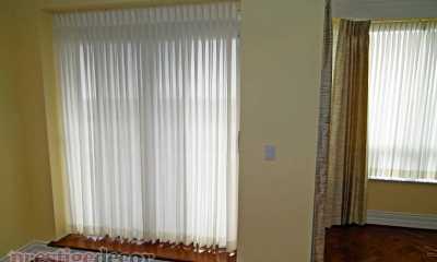 Condo sheer curtains on balcony door