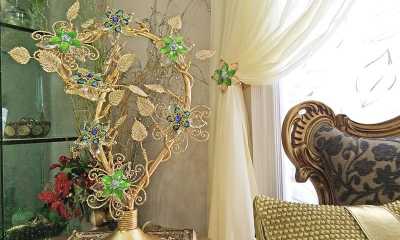 Luxurious window treatments with sheer curtains, Swarovski crystal holdbacks and Swarovski crystal lamp from Prestige Decor