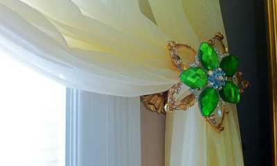Sheer curtains with Swarovski crystal holdbacks