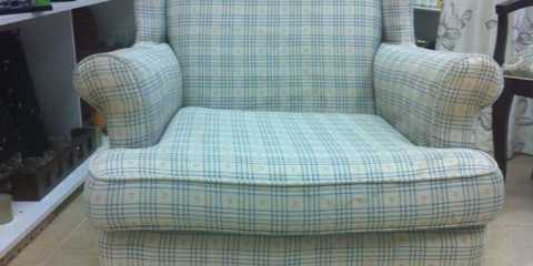 Wing chair before re­upholstery