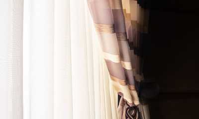 Sheer curtains with striped curtains