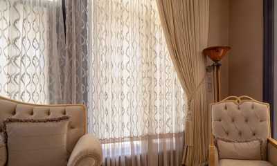 Stunning custom curtains with sheers and matching furniture upholstery