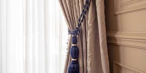 Custom curtains with sheers and blue tiebacks