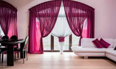 Pleated burgundy and white sheer fabric curtains and drapes