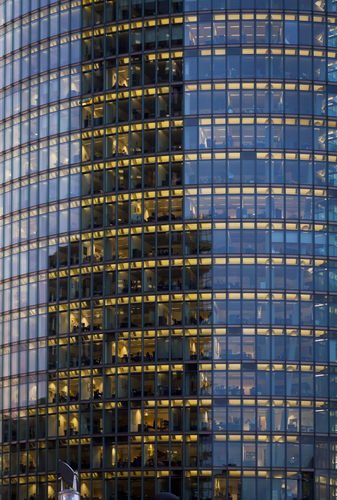 Skyscraper with office windows and glass background in Berlin, Germany
