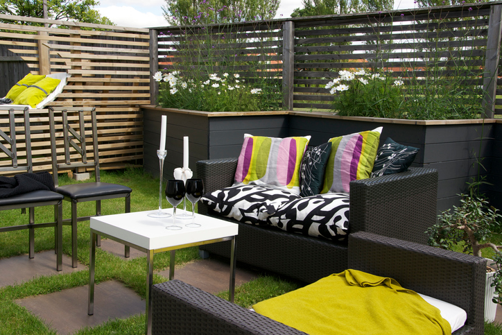 Splashy accent pillows are a huge trend for patio decoration
